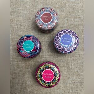 (4) soy candles in decorative tins. 4 different scents.